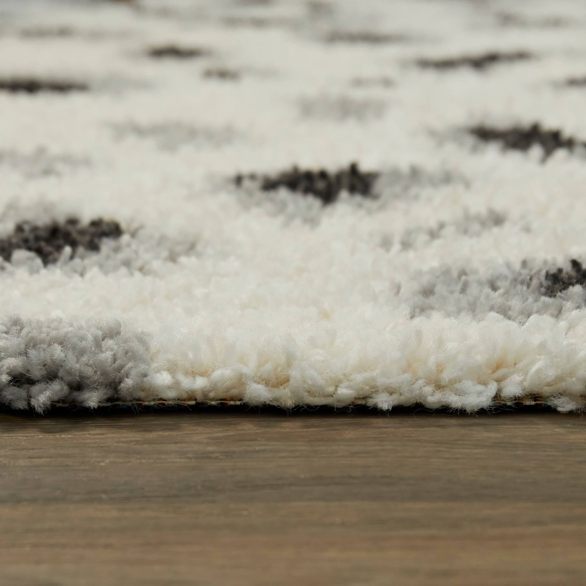 BALTA Asaro Cream 5 ft. x 7 ft. Leopard Print Shag Area Rug, Ivory