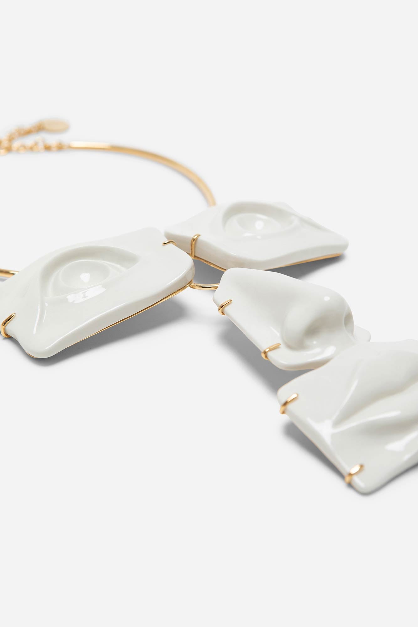 FACE STATEMENT NECKLACE